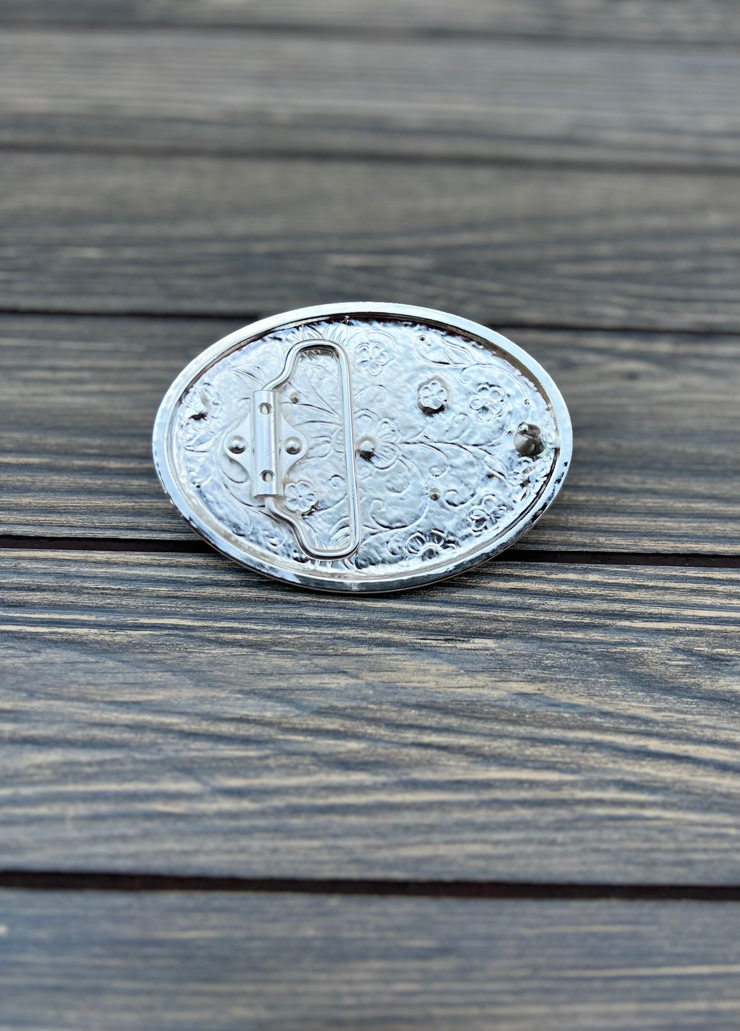 black rhinestone buckle, in oval shape, black and silver color