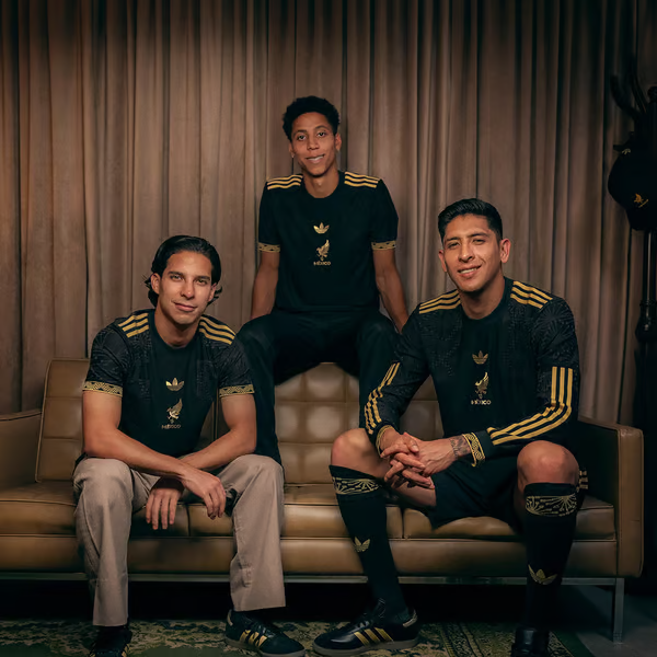 Mexico players Edson Alvarez, Diego Lainez, and Ozziel Herrara posing with the new Mexico Jersey 2025