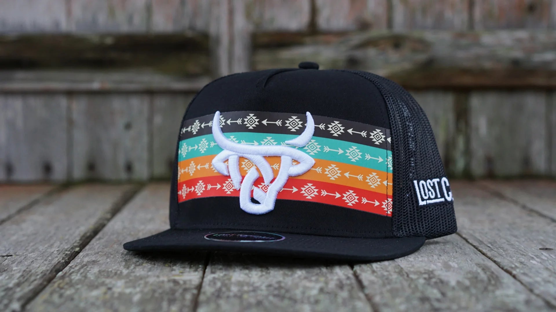 Lost calf hat, bulls lodo and an aztec design