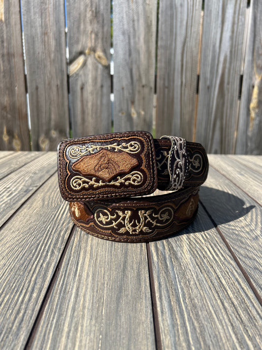 western belt for men, in the color brown. Has western embroidery and some parts of cow fur.